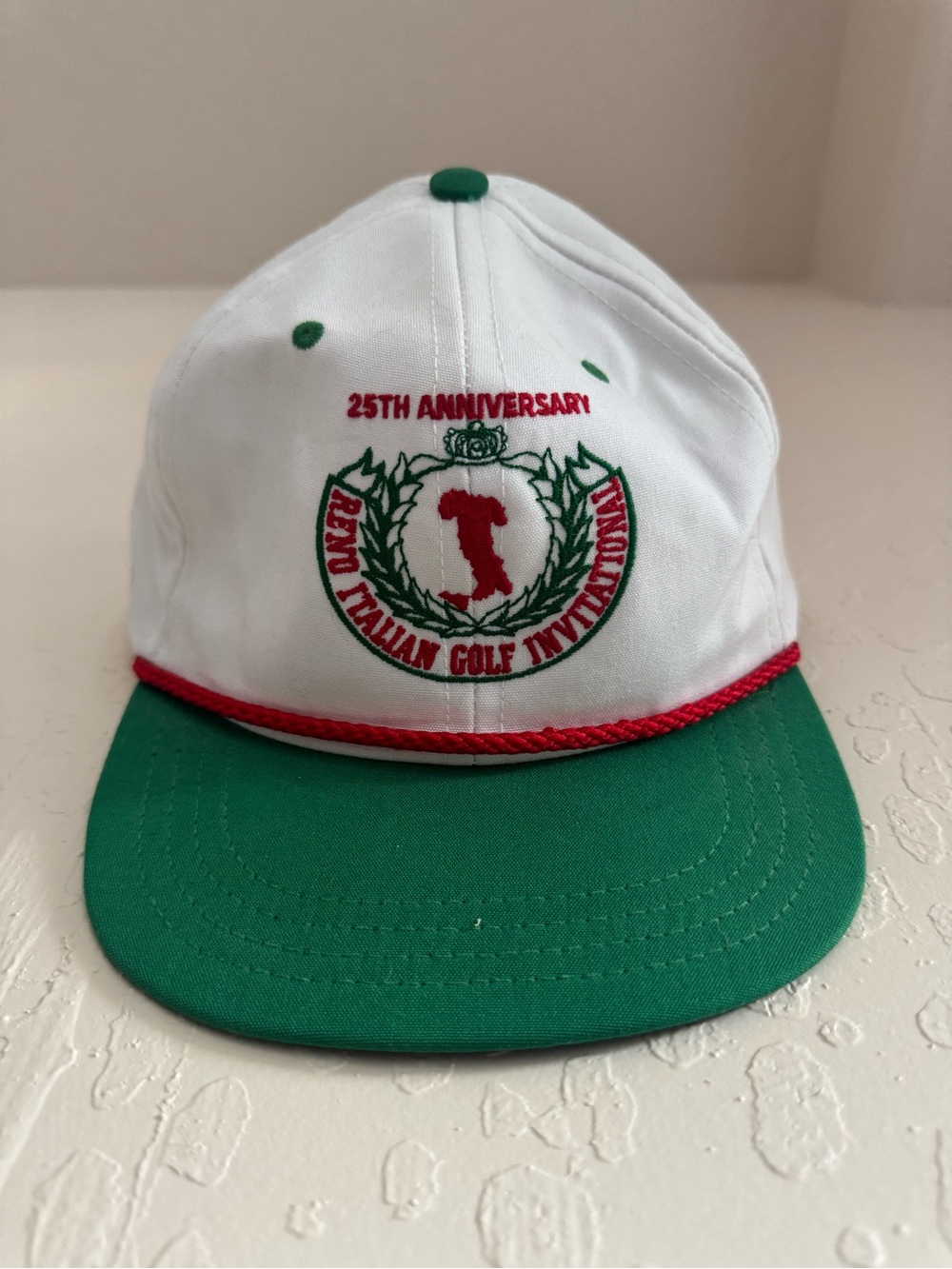 White and Green 25th Anniversary Golf Cap with Red Trim